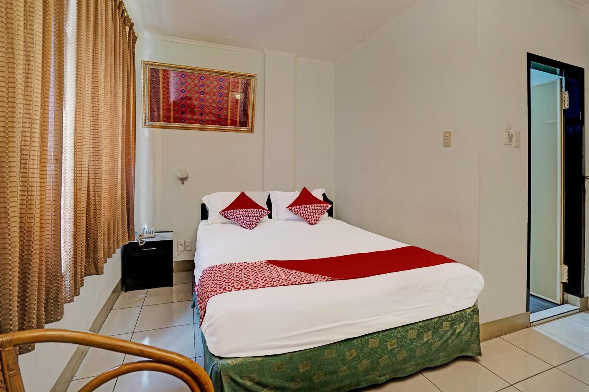 Super Oyo 91805 Hotel Wisma Bari Palembang Esterno foto