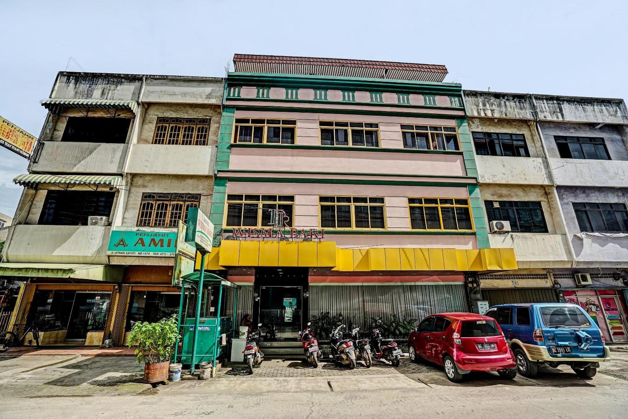 Super Oyo 91805 Hotel Wisma Bari Palembang Esterno foto